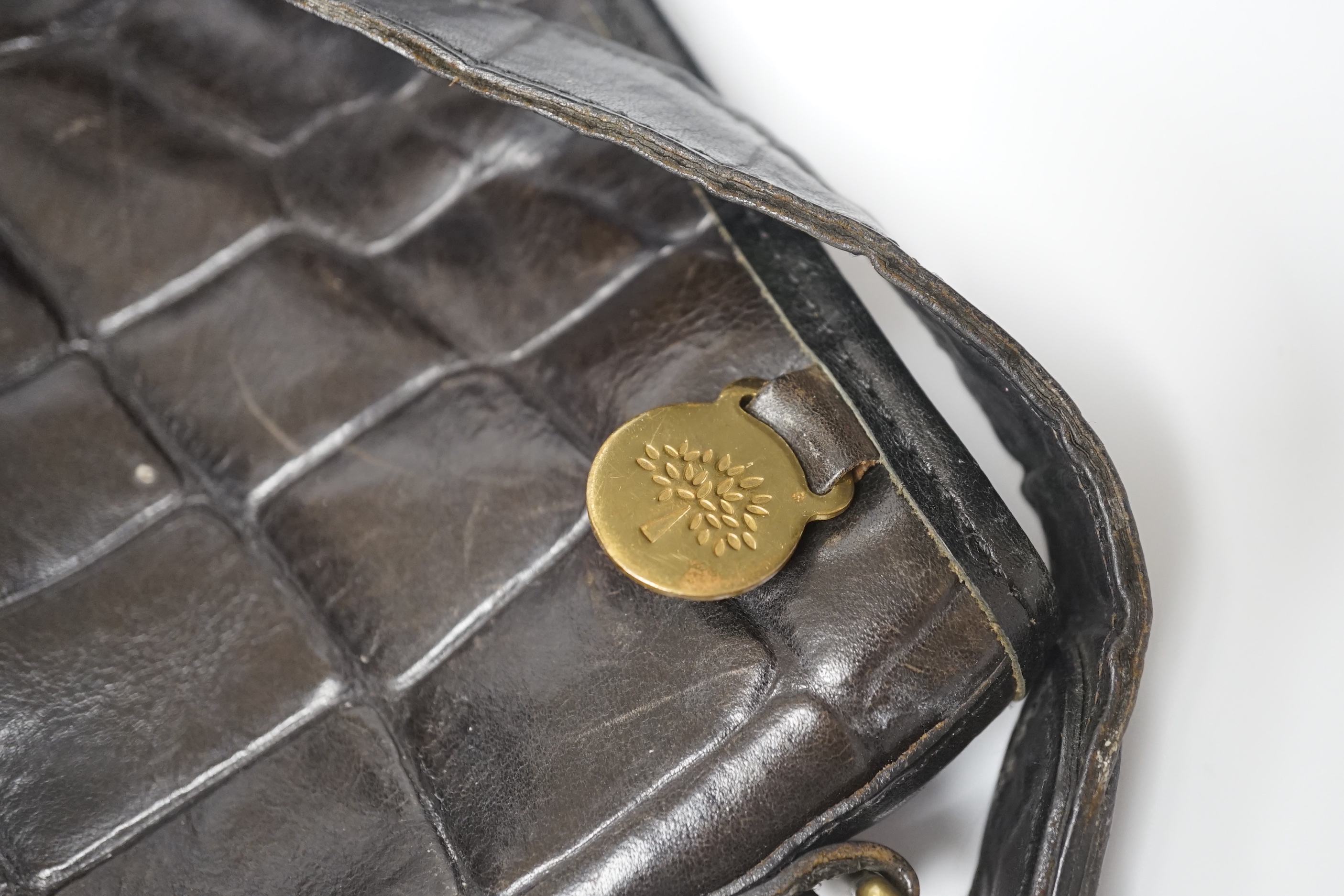 A Mont Blanc leather briefcase and a Mulberry bag with dust cover